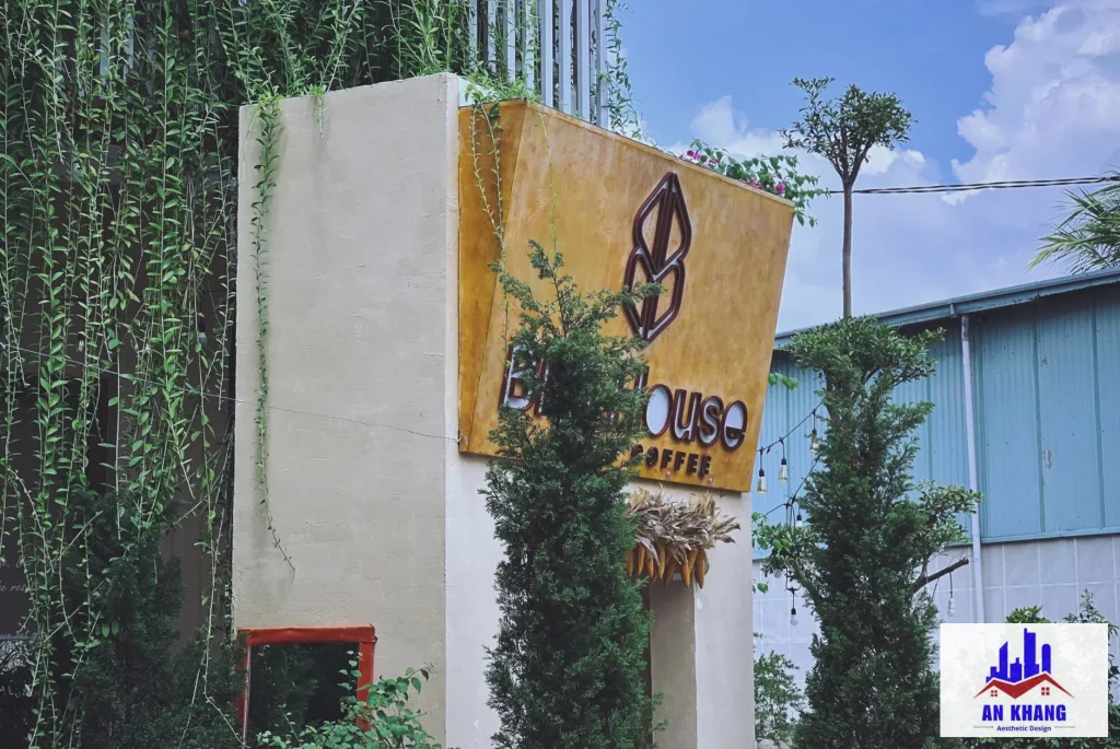 Modern cafe entrance with greenery in Ben Tre, Vietnam. Ideal for lifestyle and travel content.